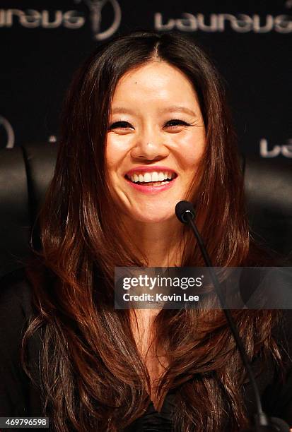 Tennis player Li Na of China talks after winning the Laureus Academy Exceptional Achievement award at the winners press conference during the 2015...