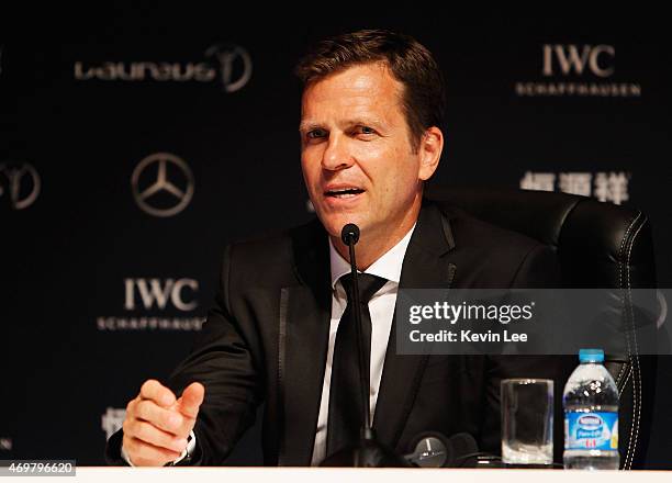 Oliver Bierhoff, Team Manager of the German National Football Team poses with the Team of the Year Award on behalf of the German National Football...