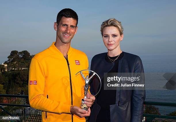 Laureus World Sportsman of the Year 2015 winner and Tennis player Novak Djokovic of Serbia receives his award from Princess Charlene of Monaco at the...