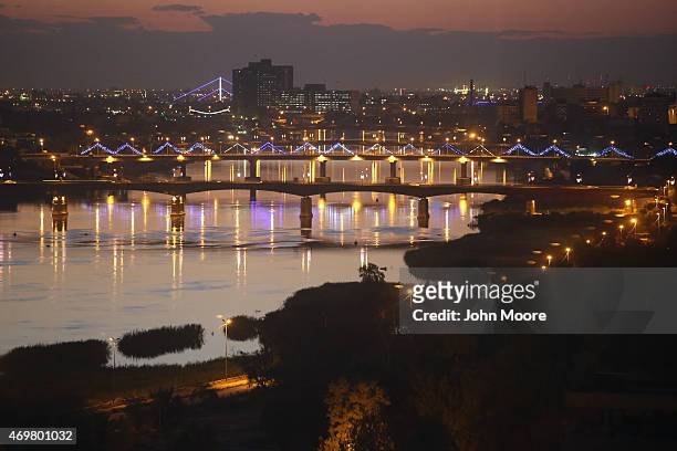 Bridges span the Tigris River into the high-security Green Zone , on April 13, 2015 in Baghdad, Iraq. Baghdad has again come to life at night...