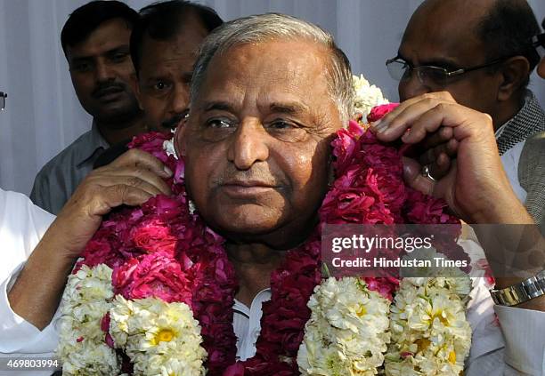 Samajwadi Party chief Mulayam Singh being garlanded after merger of six parties on April 15, 2015 in New Delhi, India. After months of deliberation,...