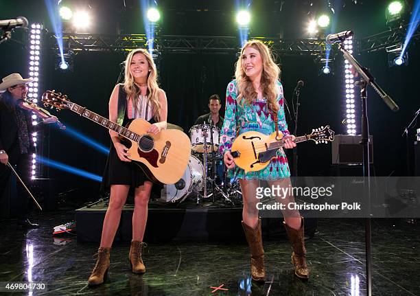 Vocalists Taylor Dye and Madison Marlow of the musical duo Maddie and Tae perform at the "Reba and Friends Outnumber Hunger" concert event on...