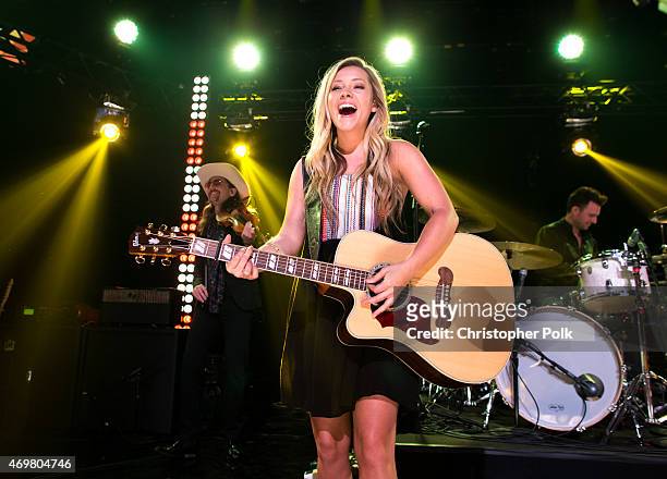 Vocalist Taylor Dye of the musical duo Maddie and Tae performs at the "Reba and Friends Outnumber Hunger" concert event on Tuesday, March 31, 2015 in...