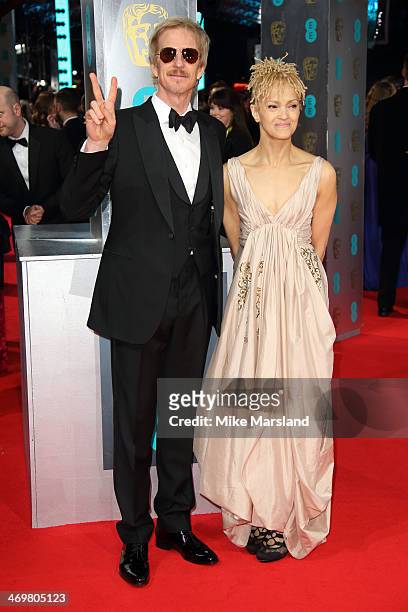 Matthew Modine and wife, Caridad Rivera attend the EE British Academy Film Awards 2014 at The Royal Opera House on February 16, 2014 in London,...