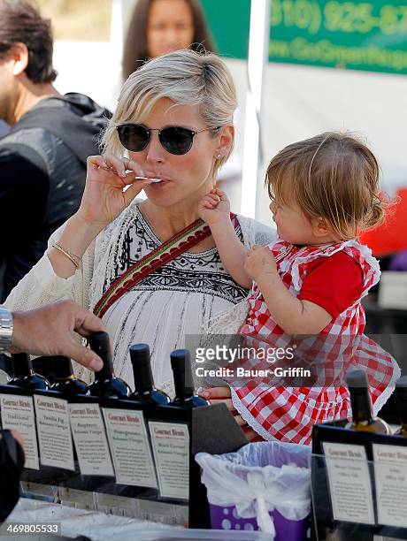 Elsa Pataky is seen at a farmers market with her daughter India Rose Hemsworth on February 16, 2014 in Los Angeles, California.