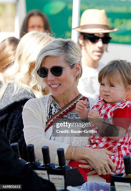 Elsa Pataky is seen at a farmers market with her daughter India Rose Hemsworth on February 16, 2014 in Los Angeles, California.