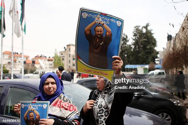 Group of Palestinian gather to hold a demonstration demanding the release of Marwan Barghouti, leader of the Palestinian group Fatah, prisoned in the...