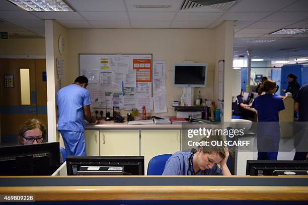 Members of clinical staff work at computers in the Accident and Emergency department of the 'Royal Albert Edward Infirmary' in Wigan, north west...
