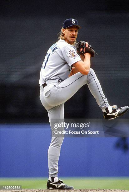 Pitcher Randy Johnson of the Seattle Mariners pitches against the New York Yankees during an Major League Baseball game circa 1995 at Yankee Stadium...