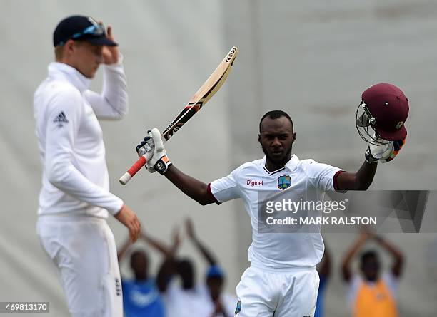 West Indies batsman Jermaine Blackwood celebrates scoring his century on day three of the first test match between West Indies and England at the Sir...