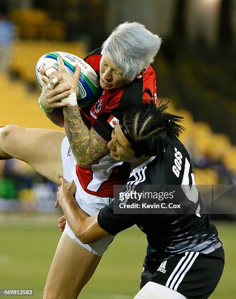 Jennifer Kish of Canada catches a kickoff against Sarah Goss of New Zealand during the Women's Sevens World Series at Fifth Third Bank Stadium on...