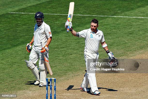 Brendon McCullum of New Zealand celebrates his double century while teammate BJ Watling looks on during day four of the 2nd Test match between New...