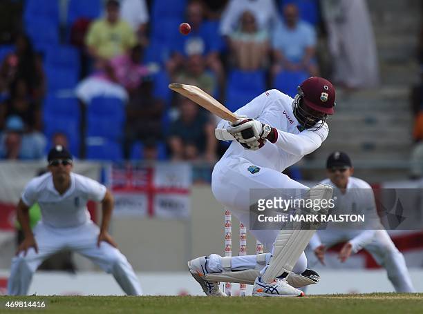 West Indies batsman Sulieman Benn attempts to hook a ball from bowler James Anderson on day three of the first test match between West Indies and...