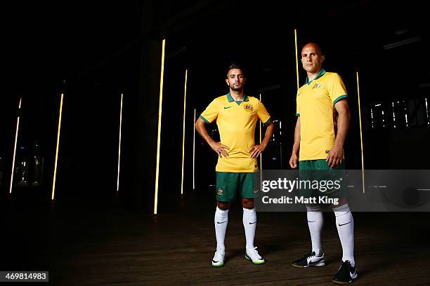 Mark Bresciano and Michael Zullo pose during the Australian Socceroos 2014 FIFA World Cup kit launch on February 17, 2014 in Sydney, Australia.