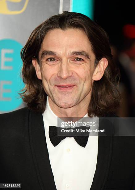 Justin Chadwick attends the EE British Academy Film Awards 2014 at The Royal Opera House on February 16, 2014 in London, England.