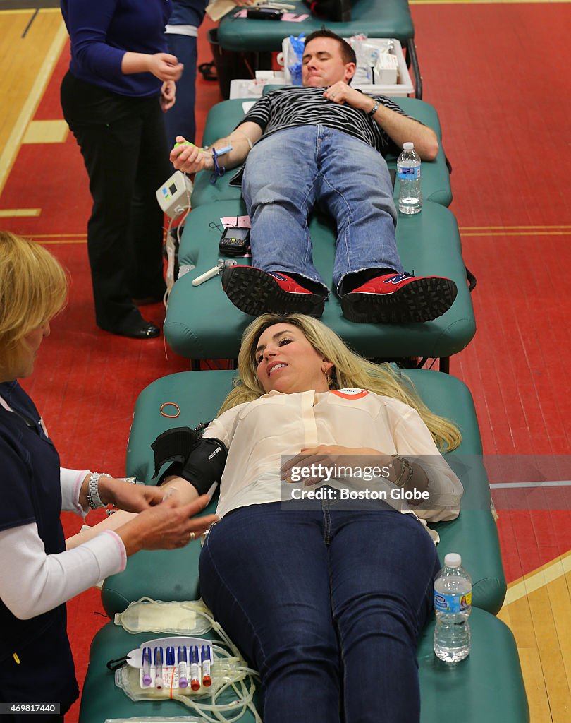 Richard Donohue, Heather Abbott Give Blood In Watertown