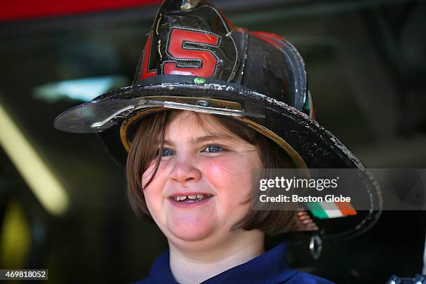 The Richard family, along with Mayor Marty Walsh, visit the Engine 33 and Ladder 15 Boston Firehouse on Boylston Street, from which firefighters...