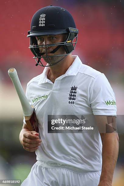 Jonathan Trott of England walks dejectedly back to the pavillion after being dismissed for 4 runs off the bowling of Jerome Taylor of West Indies...