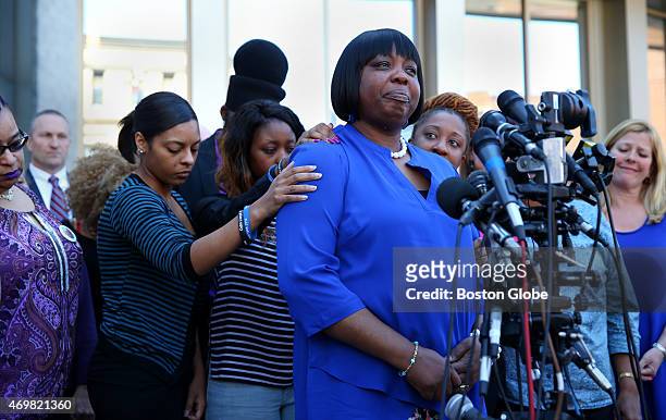 Ursula Ward, the mother of Odin Lloyd, is comforted by Lloyd's girlfriend Shaneah Jenkins, left, and Lloyd's sister Olivia Thibou, middle. Ward spoke...