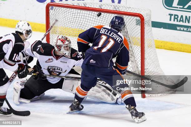 Matt Bellerive of the Kamloops Blazers scores against goaltender Jared Rathjen of the Vancouver Giants during the second period of their WHL game at...