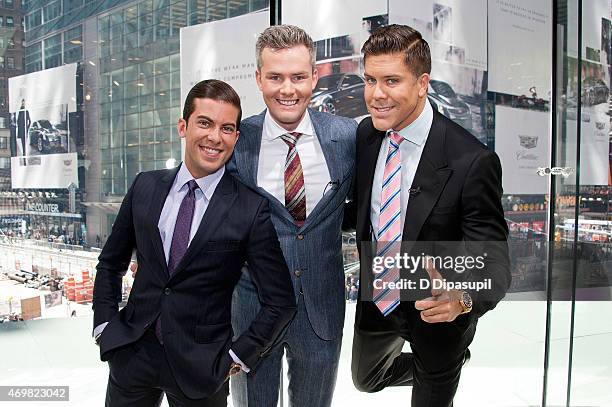 Luis D. Ortiz, Ryan Serhant, and Fredrik Eklund of "Million Dollar Listing New York" visit "Extra" at their New York studios at H&M in Times Square...