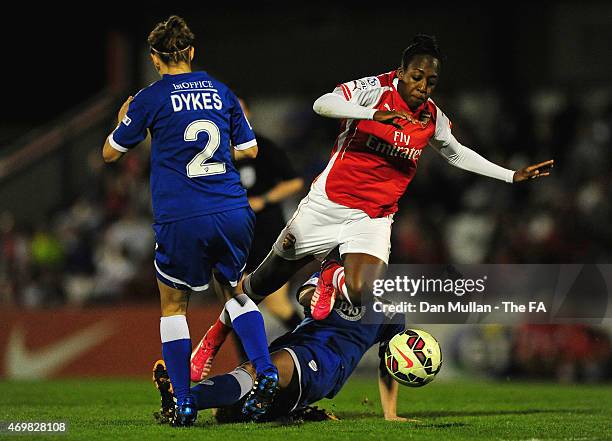 Dan Carter of Arsenal is tackled by Angharad James and Loren Dykes of Bristol during the WSL match between Arsenal Ladies and Bristol Academy Women...