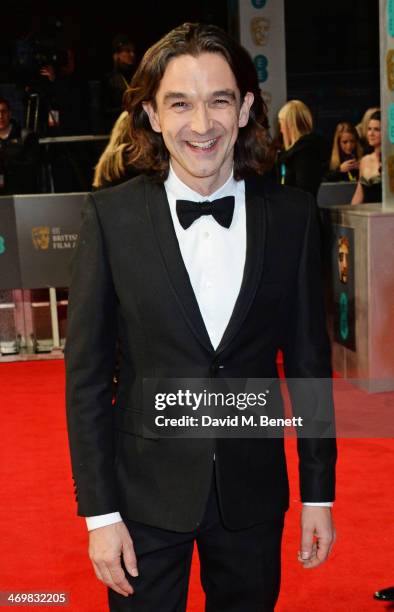 Justin Chadwick attends the EE British Academy Film Awards 2014 at The Royal Opera House on February 16, 2014 in London, England.