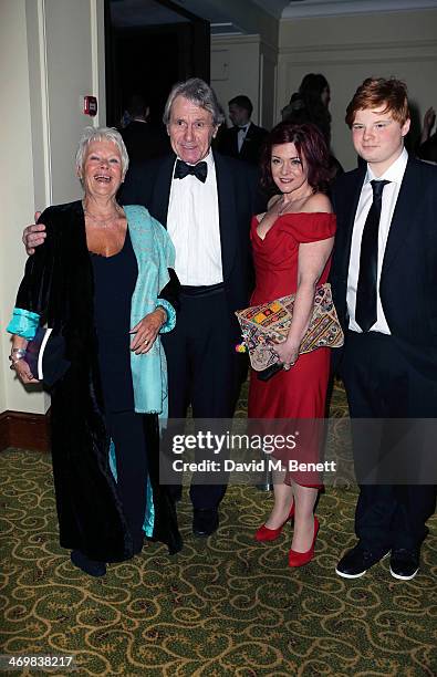 Dame Judi Dench, David Mills, Finty Williams and Sam Williams attend the official dinner party after the EE British Academy Film Awards at The...