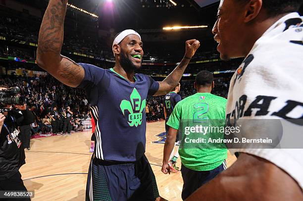 LeBron James and John Wall of the Eastern Conference All-Stars celebrate after the 2014 NBA All-Star Game as part of the 2014 All-Star Weekend at...