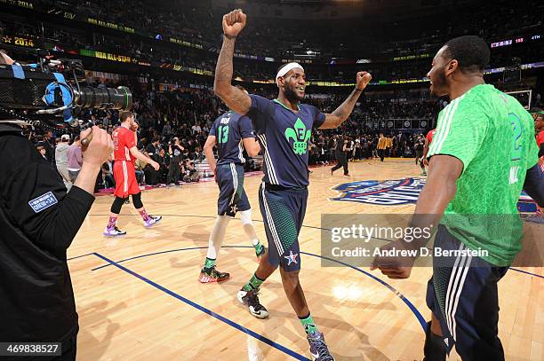 LeBron James and John Wall of the Eastern Conference All-Stars celebrate after the 2014 NBA All-Star Game as part of the 2014 All-Star Weekend at...