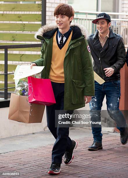 Min-Hyun of NU'EST attends the School of Performing Arts Seoul graduation on February 13, 2014 in Seoul, South Korea.