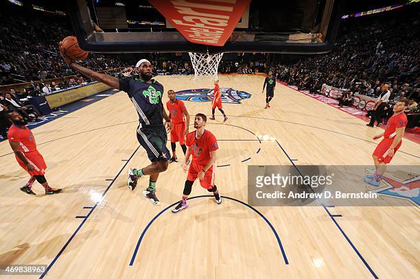 LeBron James of the Eastern Conference All-Stars attempts a dunk during the 2014 NBA All-Star Game as part of the 2014 All-Star Weekend at Smoothie...
