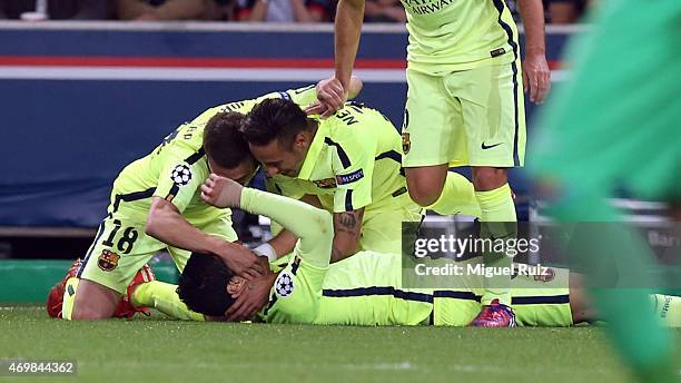 Luis Suarez of FC Barcelona celebrates with his team-mates as he scored the second goal during the UEFA Champions League 1/4 1st leg match between...