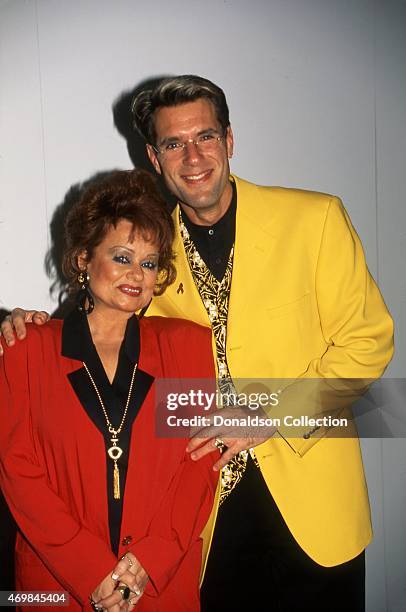 Evangelist and television personality Tammy Faye Bakker and actor Jim J. Bullock pose for a portrait at The National Association of Television...