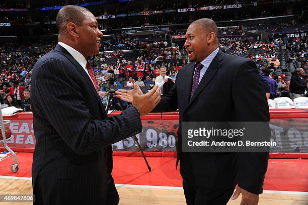 Doc Rivers of the Los Angeles Clippers and Melvin Hunt of the Denver Nuggets speak before a game at STAPLES Center on April 13, 2015 in Los Angeles,...