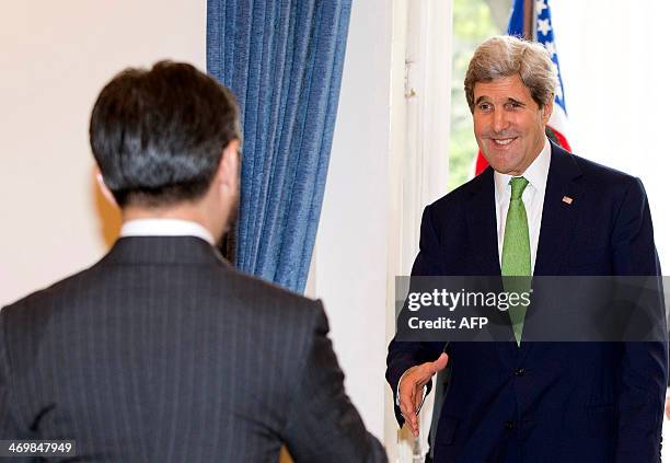 Secretary of State John Kerry is greeted by Indonesian Foreign Minister Marty Natalegawa at the Pancasila in Jakarta on February 17, 2014. Kerry...