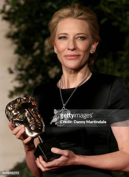 Cate Blanchett with her award attends an official dinner party after the EE British Academy Film Awards at The Grosvenor House Hotel on February 16,...