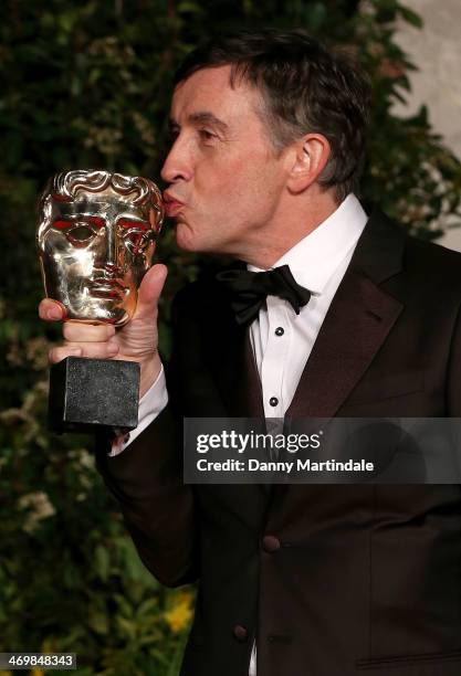 Steve Coogan with award attends an official dinner party after the EE British Academy Film Awards at The Grosvenor House Hotel on February 16, 2014...