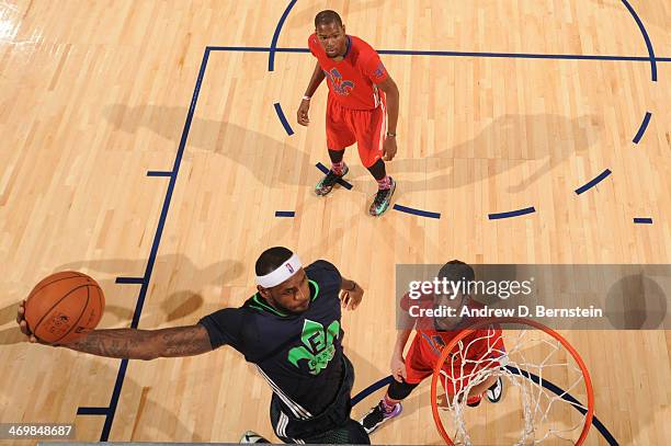 LeBron James of the Eastern Conference All-Stars attempts a dunk during the 2014 NBA All-Star Game as part of the 2014 All-Star Weekend at Smoothie...