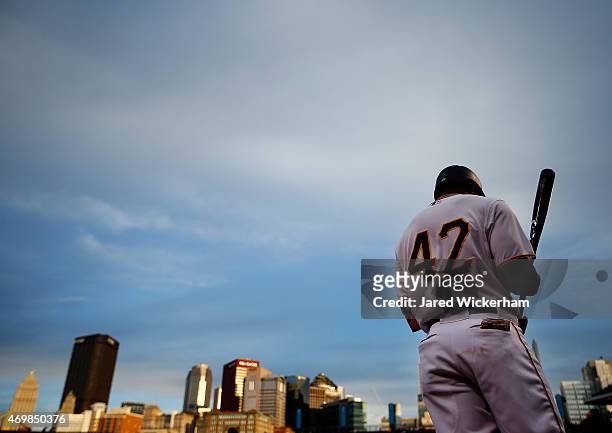 Starling Marte of the Pittsburgh Pirates warms up in the on deck circle in the second inning against the Detroit Tigers while wearing the to...