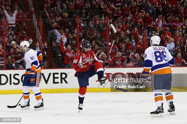 Marcus Johansson of the Washington Capitals celebrates after scoring a first period goal against the New York Islanders in Game One of the Eastern...