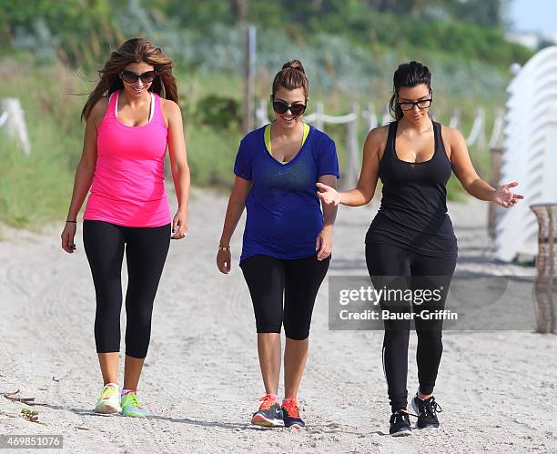 Kim Kardashian and Kourtney Kardashian are seen on October 03, 2012 in Miami, Florida.