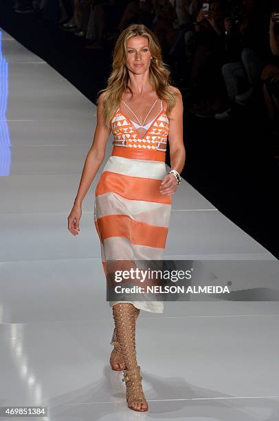 Brazilian supermodel Gisele Bundchen presents a creation by Colcci during the 2016 Summer collections of the Sao Paulo Fashion Week in Sao Paulo, on...