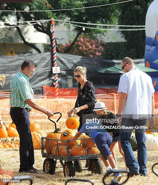 Gunther Klum , Martin Kristen and Heidi Klum with her children Leni Samuel, Henry Samuel and Lou Samuel are seen at the Mr. Bones pumpkin patch on...