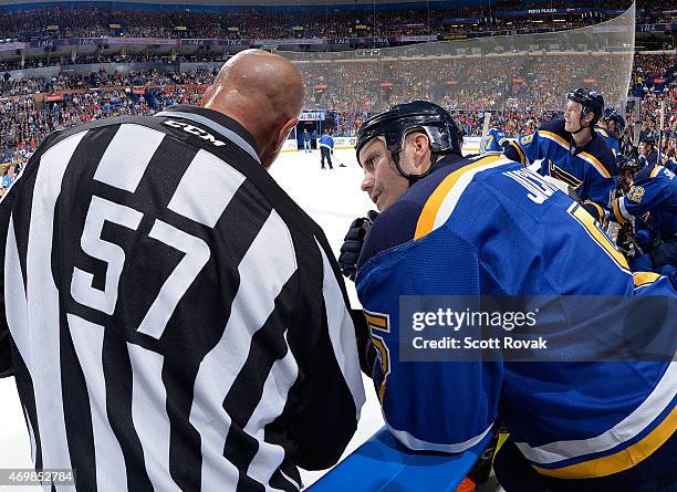 Barret Jackman of the St. Louis Blues talks with linesman Jay Sharrers during a game against the Chicago Blackhawks on April 9, 2015 at the Scottrade...