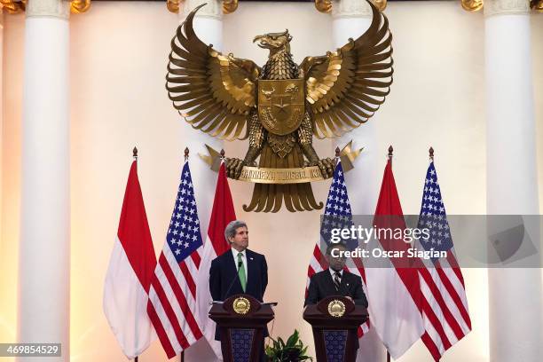 Indonesian Foreign Minister Marty Natalegawa answers questions from the media during a joint press conference with U.S. Secretary of State John Kerry...