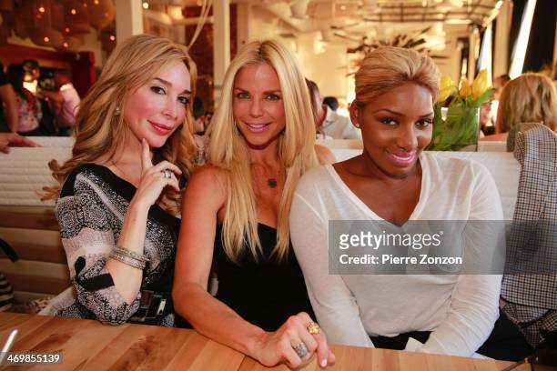 Marysol Patton, Alexia Echevarria and Nene Leaks are seen at Seasalt and Pepper Restaurant on February 16, 2014 in Miami, Florida.