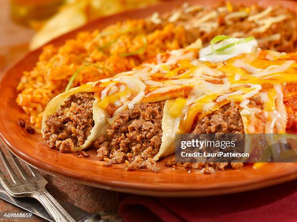 entomadas or beef enchiladas - mexican food plate stock pictures, royalty-free photos & images