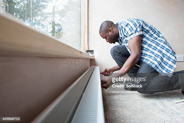 working repairman - window installation stock pictures, royalty-free photos & images