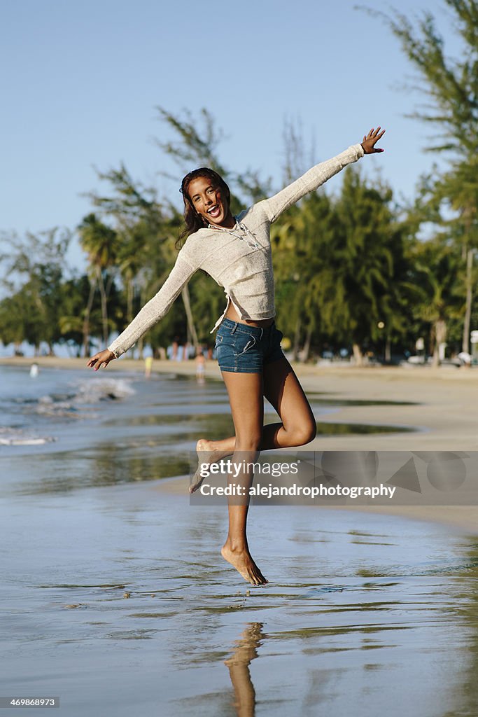 Excited girl at the beach